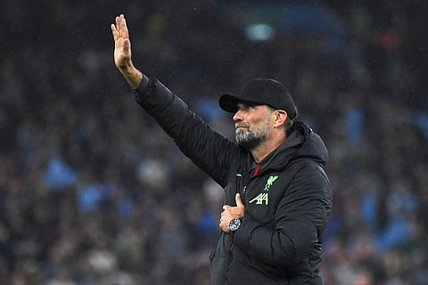 Liverpool's manager Jurgen Klopp greets supporters at the end of the English Premier League soccer match between Aston Villa and Liverpool at the Villa Park stadium in Birmingham, England, Monday, May 13, 2024.